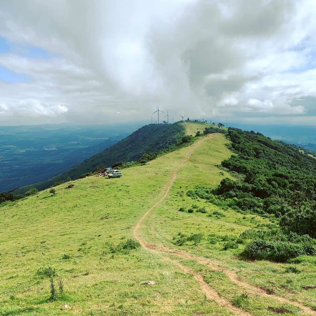 The Ngong Hills ridge trail and wind turbines.